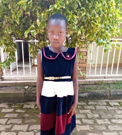 Click Jane's picture to sponsor her - She is 8 years old, loves studying, and wants to be a nurse.