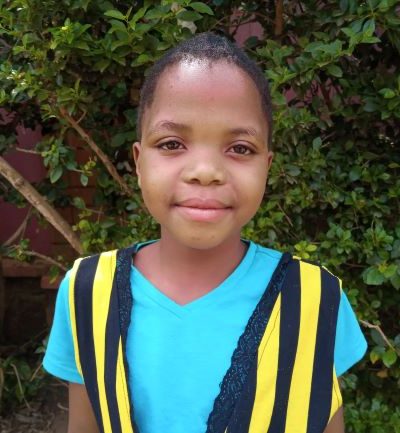 Click Daniella's picture to sponsor her - She is 10 years old, loves learning, and wants to be a lawyer.
