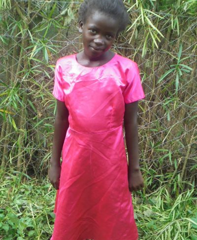Click Mitchele's picture to sponsor her - She is 8 years old, loves writing and wants to be a teacher.