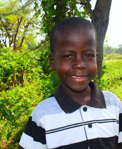 Click Eugene's picture to sponsor him - He is 5 years old, loves drawing, and wants to be a teacher.