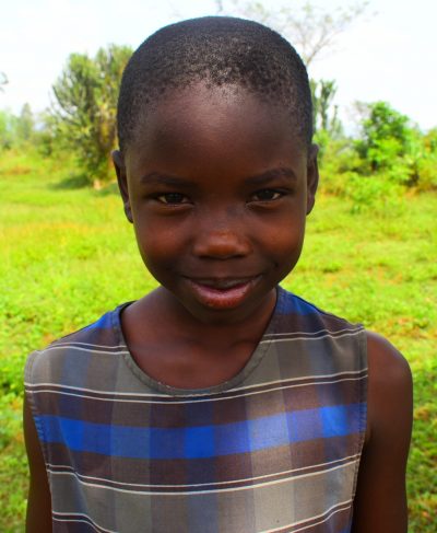 Click Judith's picture to sponsor her - She is 9 years old, loves reading and wants to be a teacher.