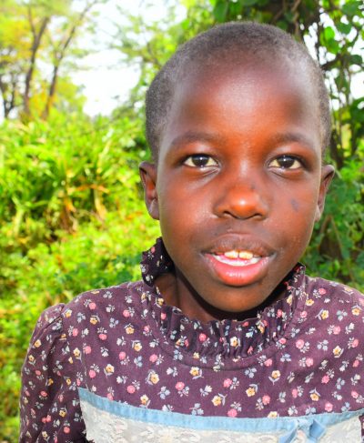 Click Leonida's picture to sponsor her - She is 4 years old, loves playing and wants to be a pilot.