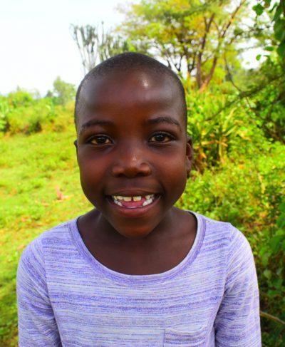 Click Mildred's picture to sponsor her - She is 6 years old, loves reading and wants to be a local administrator.