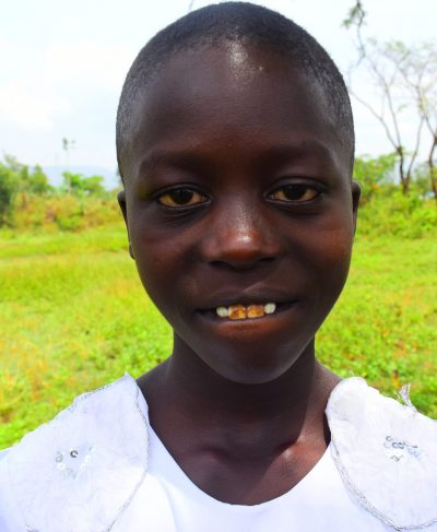 Click Viona's picture to sponsor her - She is 10 years old, loves reading and wants to be a teacher.