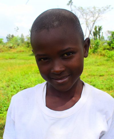 Click Fedinant's picture to sponsor her - She is 8 years old, loves reading, and wants to be a doctor.