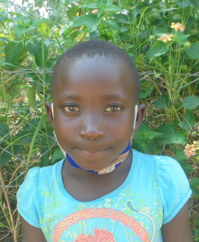 Click Mitchele's picture to sponsor her - She is 6 years old, loves flowers, and wants to be a doctor.
