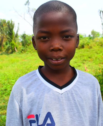 Click Alphonce's picture to sponsor her - She is 8 years old, loves school, and wants to be a teacher.