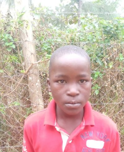 Click John's picture to sponsor him - He is 7 years old, loves reading and wants to be a farmer.