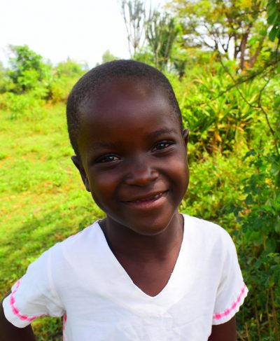 Click Beryl's picture to sponsor her - She is 6 years old, loves drawing, and wants to be a police officer.