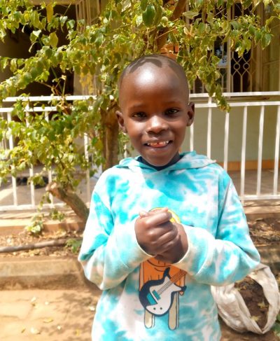 Click Isaac's picture to sponsor him - He is 7 years old, loves math, and wants to be a doctor.