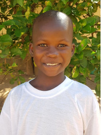 Click Judith's picture to sponsor her - She is 9 years old, loves writing, and wants to be a pilot.