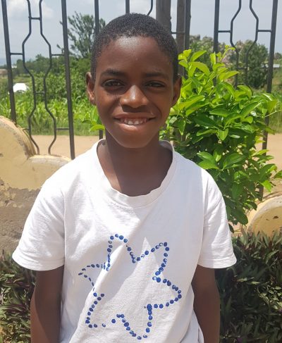 Click Josephat's picture to sponsor him - He is 13 years old, loves studying Swahili, and wants to be a soldier.