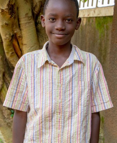 Click Oscar's picture to sponsor him - He is 12 years old, loves Science, and wants to be a Pilot.