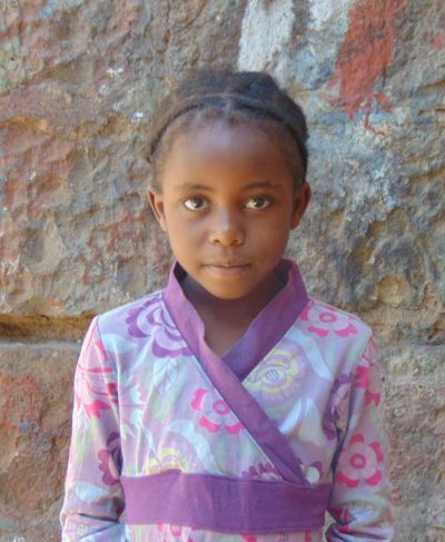 Click Elizabeth's picture to sponsor her - She is 8 years old, enjoys math, and wants to be a doctor.