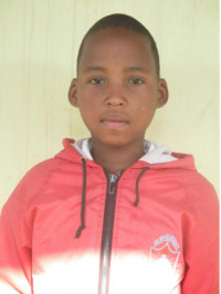 Click Dantay's picture to sponsor him - He is 9 years old, enjoys math and wants to be a policeman.