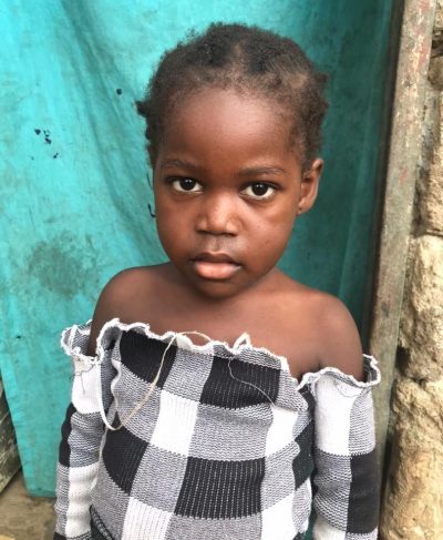 Click Marthe's picture to sponsor her - She is 5 years old, loves to count and color, and wants to become a seamstress.
