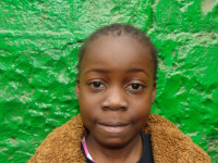 Click Karshyny's picture to sponsor her - She is 6 years old, loves learning English, and wants to be a doctor.