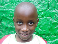 Click Tabitha's picture to sponsor her - She is 8 years old, loves math, and wants to be a teacher.