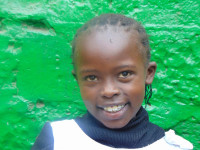 Click Viginia's picture to sponsor her - She is 8 years old, loves reading, and wants to be a doctor.