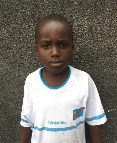 Click Vainqueur's picture to sponsor him - He is 9 years old, likes writing and wants to be a doctor.