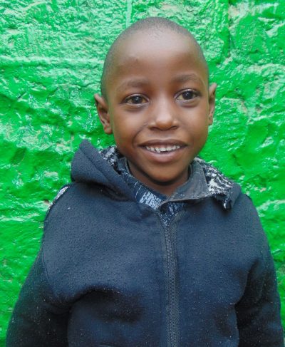 Click Felix's picture to sponsor him - He is 7 years old, enjoys drawing and hopes to be a police officer.