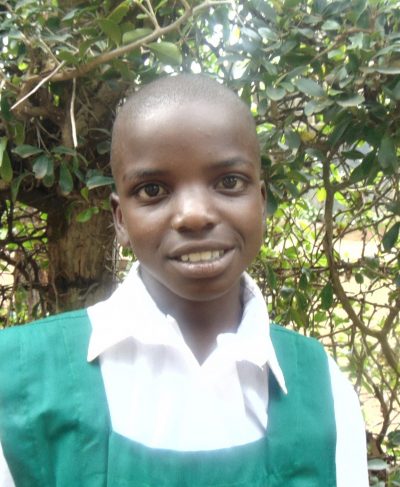 Meet Pamela - She is 11 years old, she loves Kiswahili and hopes to become a teacher one day. Click Pamela's picture to sponsor her!