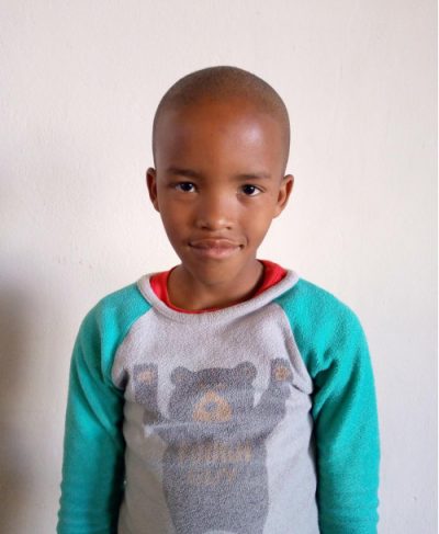 Click Deviano's picture to sponsor him - He is 9 years old, loves life skills, and wants to be a policeman.