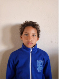 Click Taylor's picture to sponsor him - He is 8 years old, enjoys learning life skills, and wants to be a policeman.