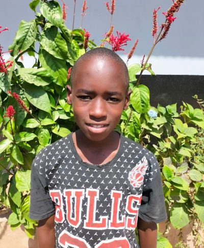 Click Alphonce's picture to sponsor him - He is 12 years old, loves Swahili, and wants to be a soldier.