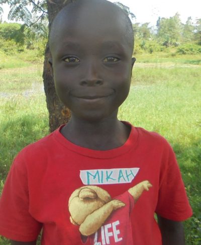 Click Mika's picture to sponsor him - He is 8 years old, loves Swahili, and wants to be an engineer.