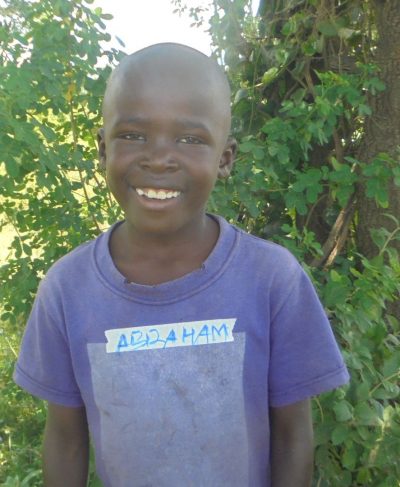 Click Abraham's picture to sponsor him - He is 8 years old, loves Environment, and wants to be a driver.