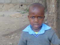Click Brian's picture to sponsor him - He is 8 years old, enjoys drawing and hopes to be a constructor.