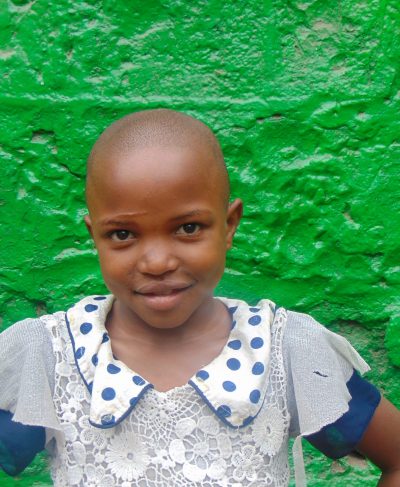 Click Isca's picture to sponsor her - She is 8 years old, enjoys Swahili and hopes to be a doctor.