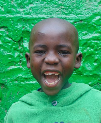 Click Japheth's picture to sponsor him - He is 8 years old, enjoys playing and hopes to be an architect.