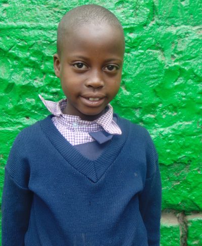 Click Magret's picture to sponsor her - She is 9 years old, enjoys writing and hopes to be a doctor.