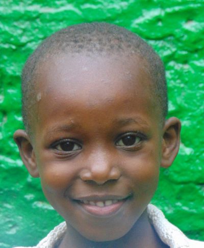Click Mary's picture to sponsor her - She is 8 years old, enjoys reading and hopes to be a businesswoman.