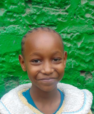 Click Mercy's picture to sponsor her - She is 9 years old, enjoys reading and hopes to be a doctor.