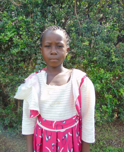 Click Yvone's picture to sponsor her - She is 9 years old, enjoys math, and wants to be a businesswoman.